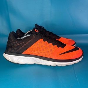 Nike Orange and Black Athletic Shoes for Performance
